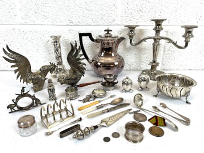 Collection of vintage silverware and decor