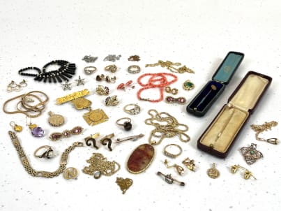 Variety of gold jewellery pieces displayed