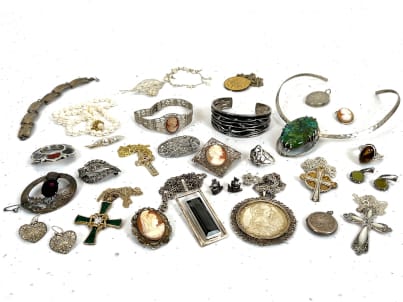 Variety of silver jewellery pieces displayed
